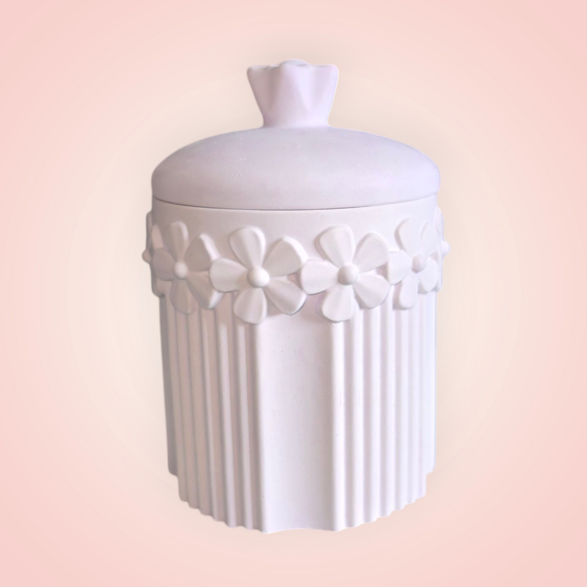 Handmade flower pot design candle container filled with soy wax. 