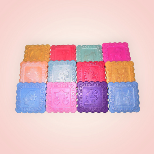 handmade square shape wax melts, each feauring zodiac star signs.